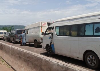 PHOTOS: Commuters trapped on flooded Abuja-Lokoja road