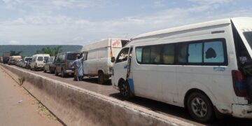 PHOTOS: Commuters trapped on flooded Abuja-Lokoja road