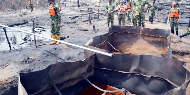 Army destroys 20 illegal refineries, seize 22 boats, weapons