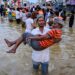 Death toll tops 1,200 as scientists declare Asian floods the 'new normal' 97 Death toll tops 1,200 as scientists declare Asian floods the ‘new normal’