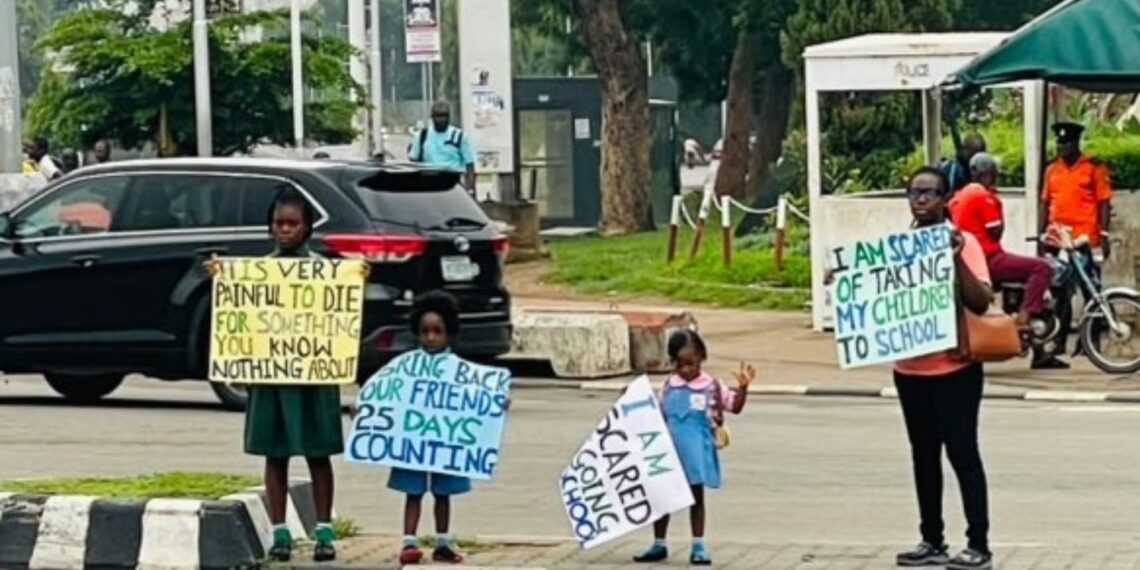 VIDEO: Abuja mother, three children stage protest over abducted Oyo pupils, teachers and principal