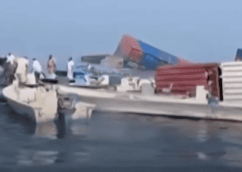 Two cargo ships sink near Strait of Hormuz as attacks intensify