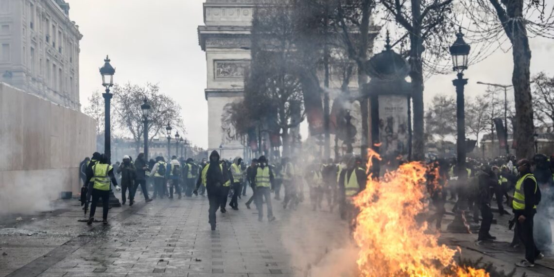 France protest arrests top 1,800 as violence leaves Paris streets damaged
