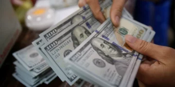 Dollar slips after two-week rally as risk appetite improves