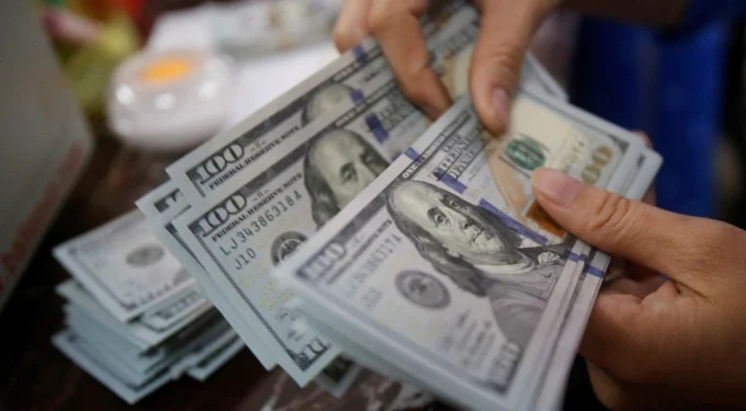 Dollar slips after two-week rally as risk appetite improves